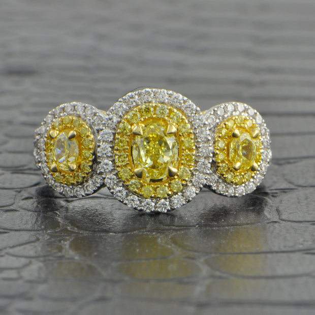 Three Stone Fancy Yellow Diamond Ring in 18k White Gold