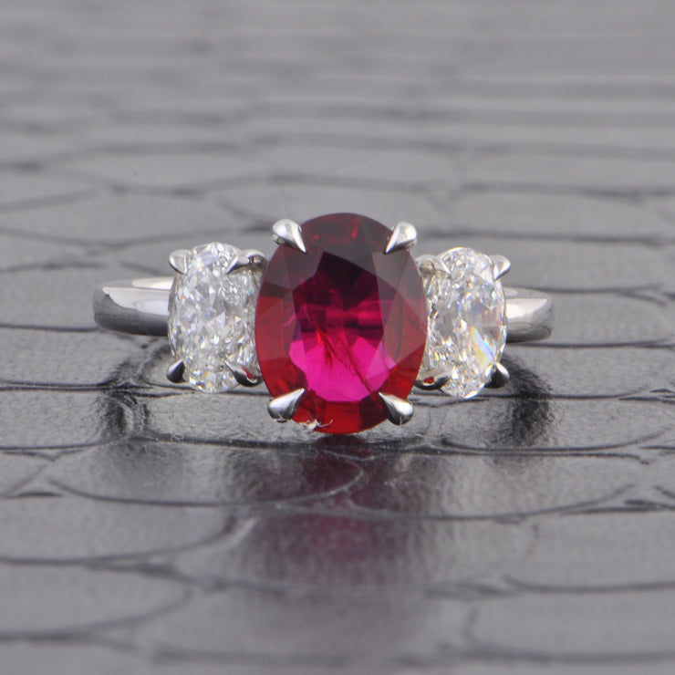 Ruby and Oval Cut Diamond Ring in Platinum