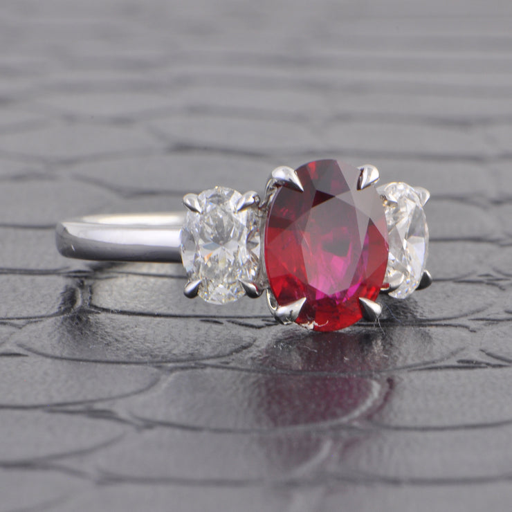 Ruby and Oval Cut Diamond Ring in Platinum