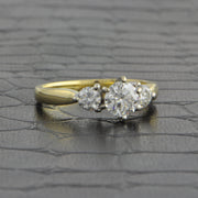 Three Stone Diamond Engagement Ring in Two Tone Gold