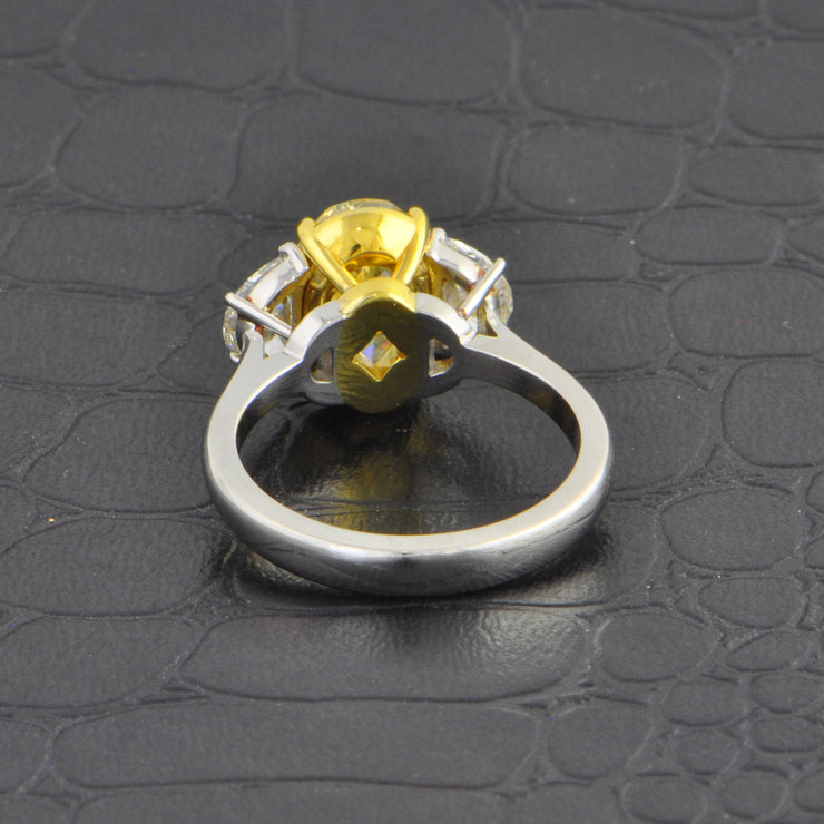 Fancy Light Yellow Oval Cut Diamond Ring in Platinum