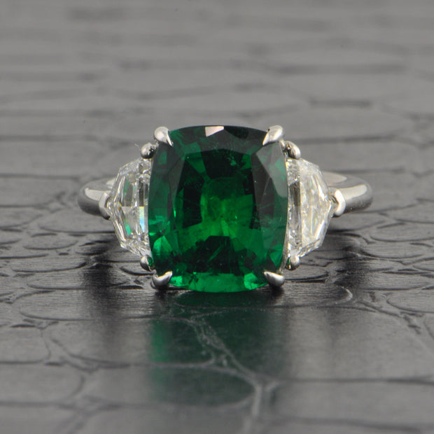 Emerald and Half-Moon Cut Diamond Ring in Platinum