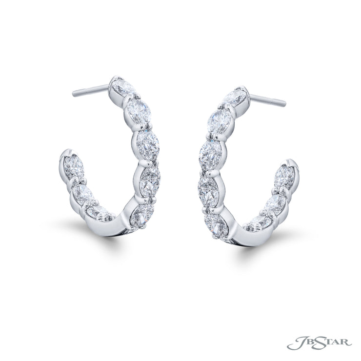 Oval Cut Diamond Huggie Earrings in Platinum