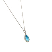 Blue Topaz and Diamond Pendant in White Gold