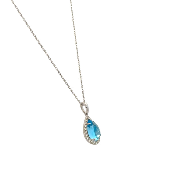 Blue Topaz and Diamond Pendant in White Gold