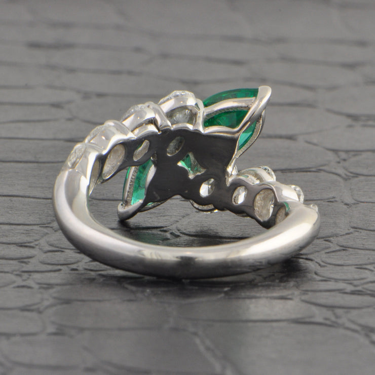 Emerald and Diamond Toi et Moi Bypass Ring in Platinum