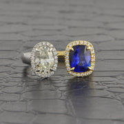 Oval Cut Diamond and Blue Sapphire Ring in Two Tone 14k Gold