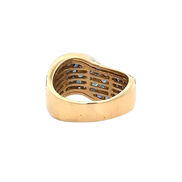 Curving Sapphire and Diamond Band in Yellow Gold