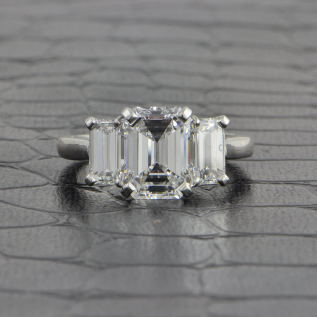 Magnificent Three Stone Emerald Cut Diamond Ring in Platinum