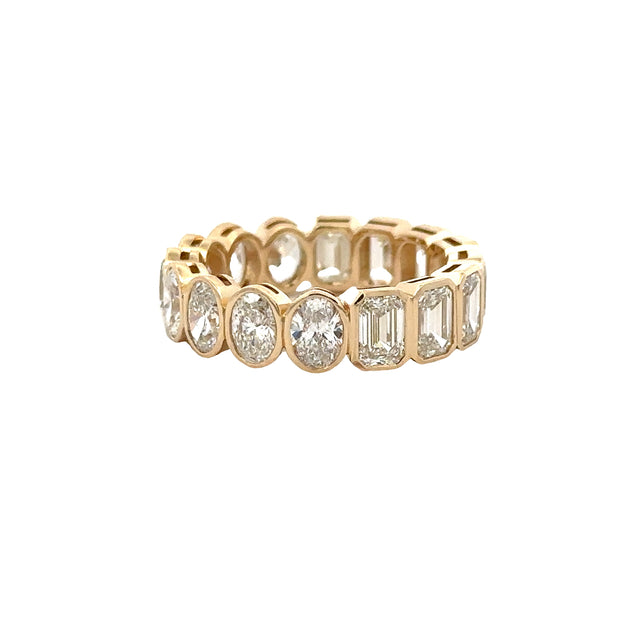 7 CTW Oval and Emerald Cut Diamond Bezel Band in Yellow Gold