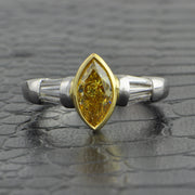 Unique Fancy Intense Yellow Marquise Cut Diamond Ring in Platinum and 18k Gold
