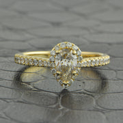 .50 ct. Pear Shape Diamond Halo Engagement Ring in Yellow Gold