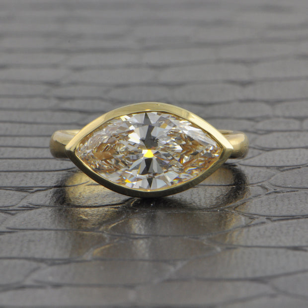 Bezel Set 3.28 ct. Marquise Cut Diamond Ring in Yellow Gold