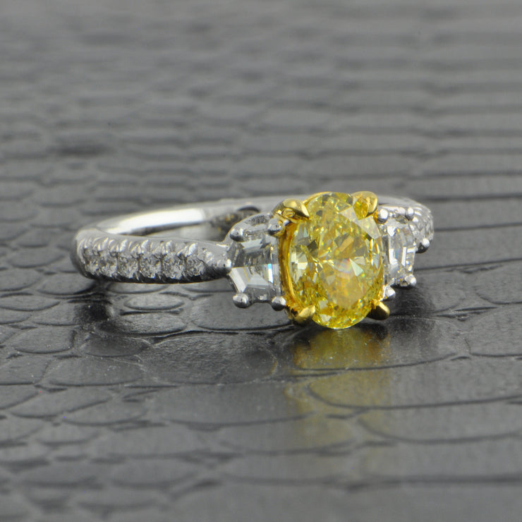 1.27 ct. Fancy Yellow Oval Cut Diamond Ring in Platinum and 18k Yellow Gold