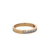 Channel Set Round Brilliant Cut Diamond Band in Yellow Gold