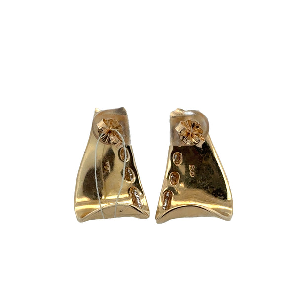 Curved Modern Diamond Huggie Earrings in Yellow Gold