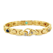 Vintage Sapphire, Ruby, and Emerald Cabochon Panther Bracelet in 18k Yellow Gold