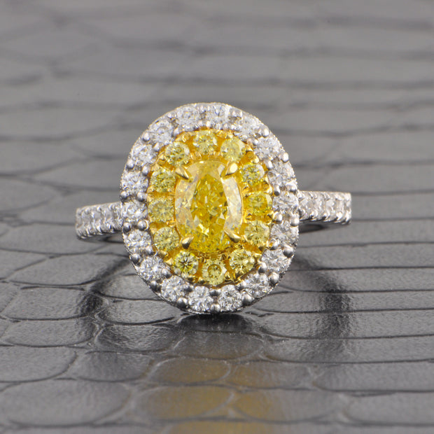 Fancy Yellow Oval Cut Diamond Halo Ring in 18k Gold