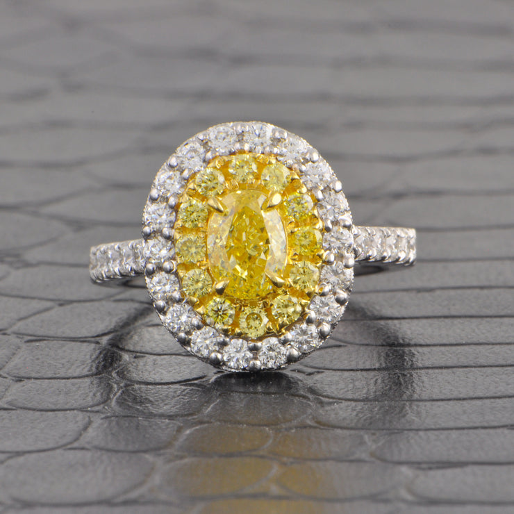 Fancy Yellow Oval Cut Diamond Halo Ring in 18k Gold