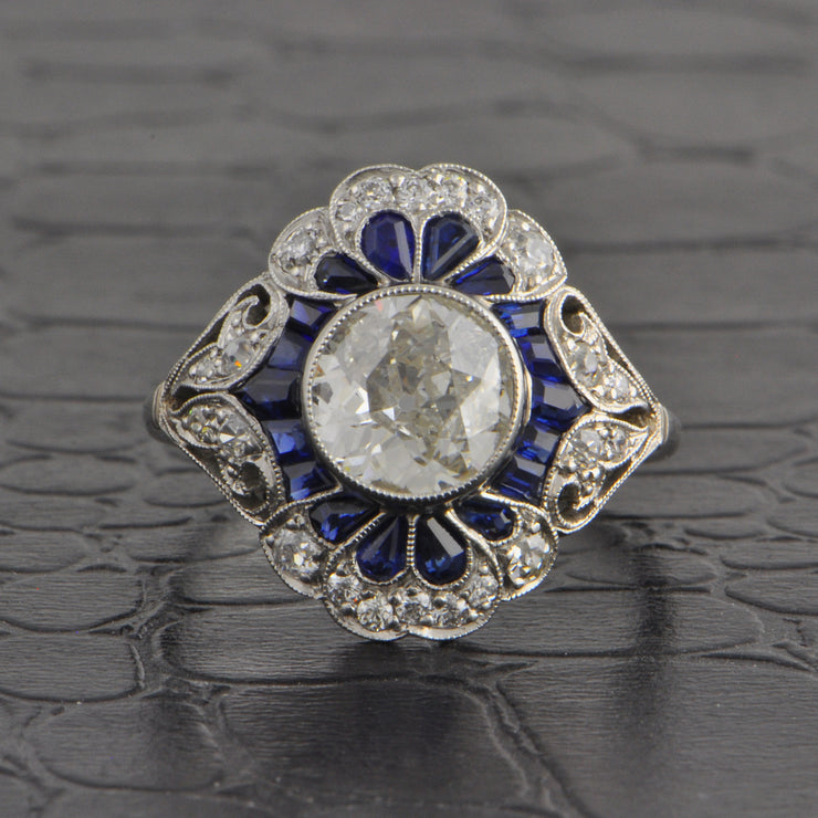 Resplendent Art Deco Old European Cut Diamond and Sapphire Ring in Platinum