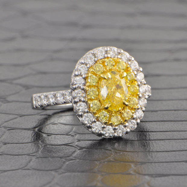 Fancy Yellow Oval Cut Diamond Halo Ring in 18k Gold