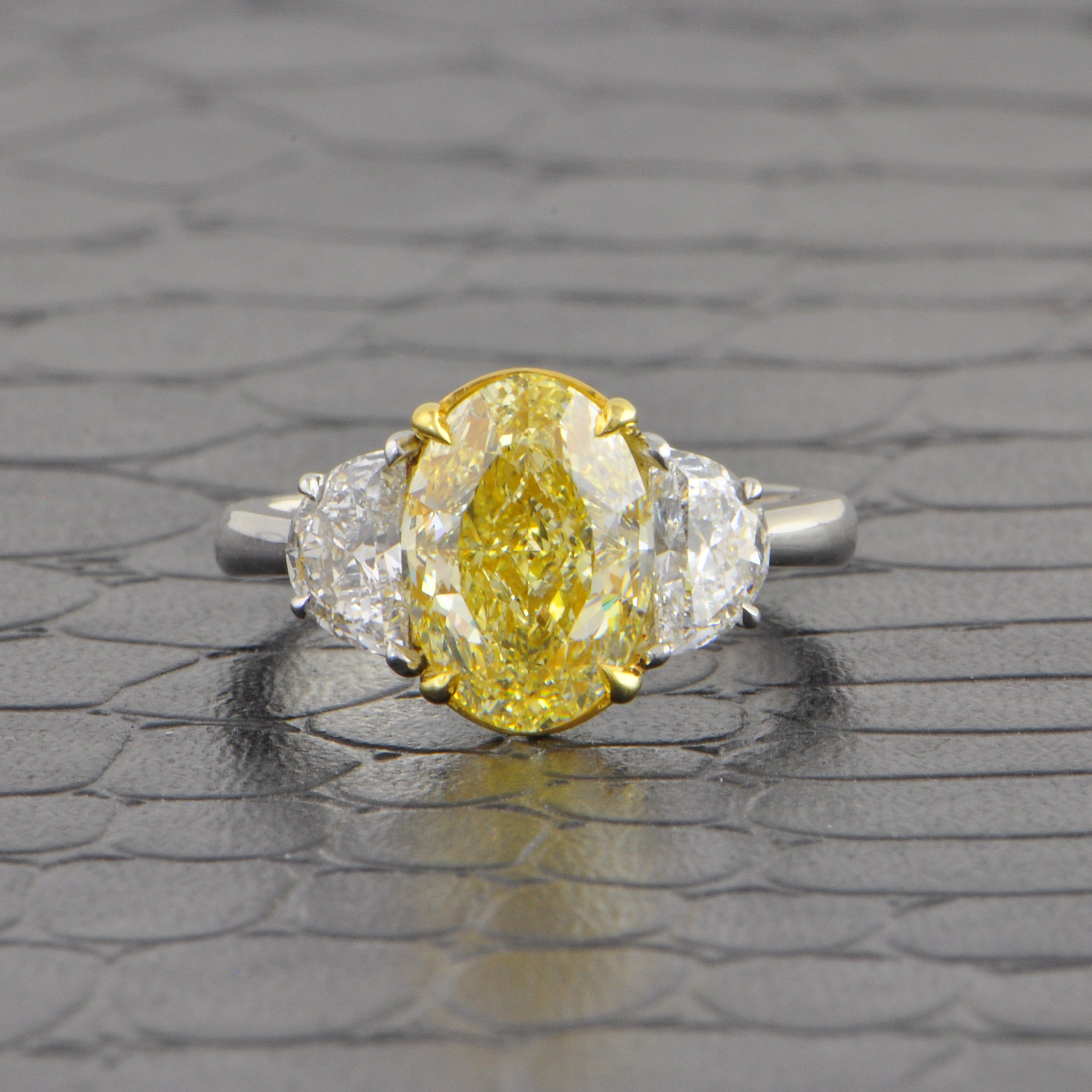 Fancy Light Yellow Oval Cut Diamond Ring in Platinum