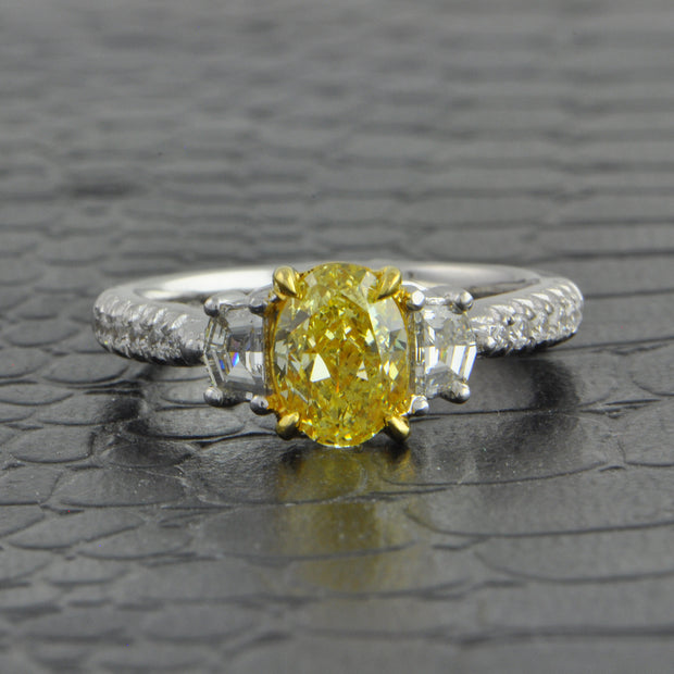 1.27 ct. Fancy Yellow Oval Cut Diamond Ring in Platinum and 18k Yellow Gold