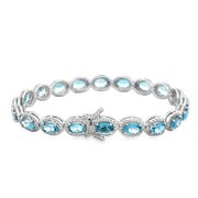 Blue Topaz and Diamond Bracelet in White Gold