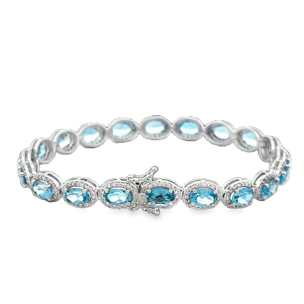 Blue Topaz and Diamond Bracelet in White Gold