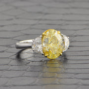 Fancy Light Yellow Oval Cut Diamond Ring in Platinum